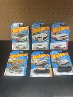 All six sealed Hot Wheels cars front view