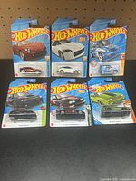 All six carded Hot Wheels cars displayed