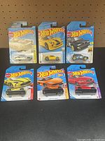 Group shot of six carded Hot Wheels cars