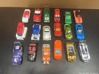 All 18 die-cast cars displayed in three rows