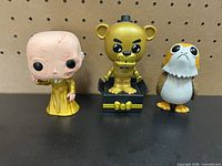 Front view of all three Funko Pop! figures