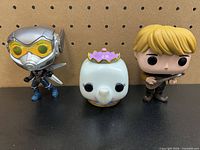 Front view of all three Funko Pop figures