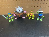 Group shot of four TMNT figures standing