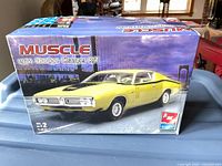 Front of box with Muscle series artwork and model identification