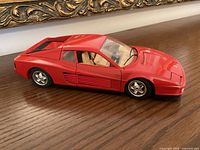 Side view of red Bburago Ferrari Testarossa model car