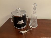 Full view of ice bucket, decanter and opener