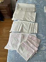 overview of all eight linen pieces on bed