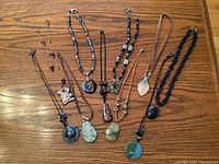 All nine necklaces laid out showing overall variety