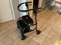 Full view of Nexus rollator showing frame, wheels, seat and brakes