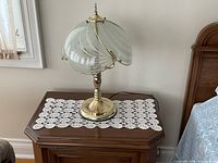 Lamp on nightstand showing full piece