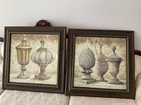 Both framed prints on sofa showing overall appearance