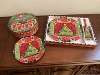 Boxed cake platter, server, dessert plates, and Stokes Holiday Celebrations packaging
