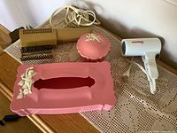 Lot overview showing both hair dryers, tissue box cover, and trinket jar