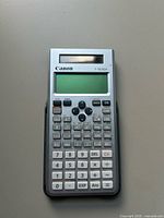 Front view of Canon F-792SGA calculator powered on