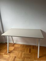 Full view of desk showing top, legs, overall condition