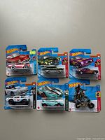 Group shot of all six carded Hot Wheels vehicles