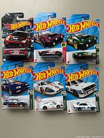 Group shot of all six sealed Hot Wheels cars on cards