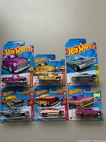 All six carded Hot Wheels cars group shot