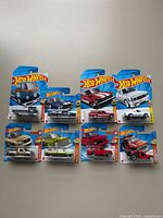 Overview of all eight Hot Wheels cars in original packaging