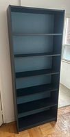 Front angled view showing bookcase color and shelf configuration