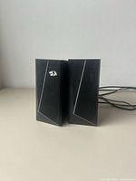 Front view of both GS520 speakers standing upright