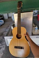 Full front view of Harmony classical guitar
