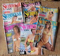 Eight Swimwear U.S.A. magazines arranged on surface showing all covers