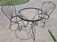Overall view of table frame with two chair frames
