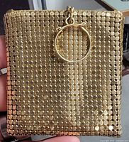 Front view showing gold hexagonal mesh and ring clasp