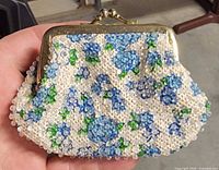 Front view showing full beaded floral exterior and clasp