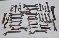 All wrenches laid out on table for count and condition