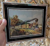 Front view of framed foil print of steam locomotive
