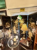 Full view of four-panel folding screen showing overall design and condition