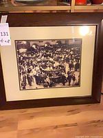 Full view of framed print showing frame, matting and image