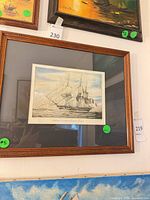 Full view of framed lithograph on wall
