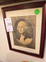 Full view of framed George Washington portrait print showing frame, mat and glass