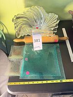 Group shot showing swirl bowl, rolling pin, aqua plate, clear plate, measuring tape
