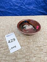 Overall view of stoneware bowl interior and exterior glaze