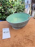 oblique view of ceramic bowl showing glaze and profile