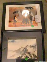 Both framed prints together showing size sticker