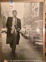 Full view of framed James Dean poster showing image and frame