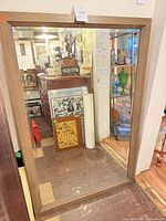 Front view of rectangular mirror with oak veneer frame
