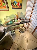 Full view of folding table set up with items on top