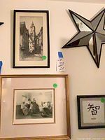 All four framed pieces on wall
