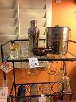 Overall view showing shaker, ice bucket, glasses, ruby bowl