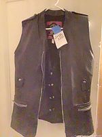 Front view of RJAYS Highway vest showing zippers, snaps, epaulets
