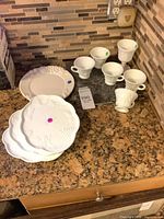 Group view of all plates and cups