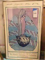 Full view of framed poster showing artwork, frame and signature