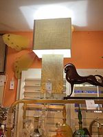 Full view of lamp showing shade, body, and base
