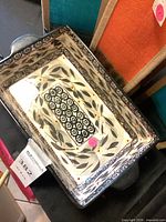 Top view of casserole inside tote bags showing pattern and overall lot